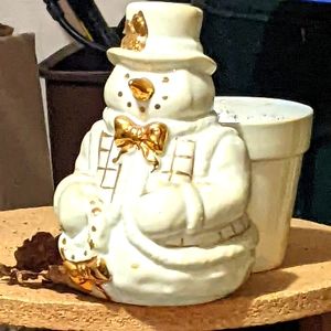 Ceramic snowman flower pot.